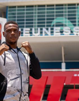 Jamahal Hill poses in front of Jeunesse Arena in Rio De Janeiro, Brazil ahead of UFC 283, January 2023 (Photo by Nolan Walker/Zuffa LLC)