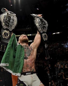 Conor McGregor of Ireland celebrates his KO victory over Eddie Alvarez of the United States in their lightweight championship bout during the UFC 205 event at Madison Square Garden on November 12, 2016 in New York City. (Photo by Jeff Bottari/Zuffa LLC)