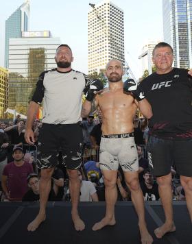 Alexander Volkanovski poses for a photo with his team during the UFC 284 Open Workouts at Elizabeth Quay - The Landing on February 9, 2023 in Perth, Australia. (Photo by Chris Unger/Zuffa LLC)