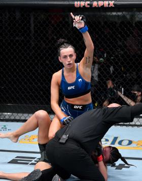 Casey O'Neill of Australia celebrates her TKO victory over Antonina Shevchenko of Kyrgyzstan in their women's flyweight bout during the UFC Fight Night event at UFC APEX on October 02, 2021 in Las Vegas, Nevada. (Photo by Jeff Bottari/Zuffa LLC)