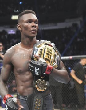 Israel Adesanya of Nigeria reacts to his Unanimous Decision win over Robert Whittaker at UFC 271: Adesanya vs Whittaker 2