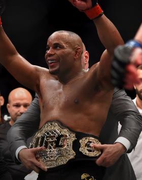  Daniel Cormier celebrates after defeating Alexander Gustafsson in their UFC light heavyweight championship bout during the UFC 192 event at the Toyota Center on October 3, 2015 in Houston, Texas. (Photo by Jeff Bottari/Zuffa Getty Images)
