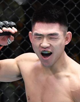 Song Yadong of China reacts after his TKO victory over Julio Arce in a bantamweight fight during the UFC Fight Night event at UFC APEX on November 13, 2021 in Las Vegas, Nevada. (Photo by Chris Unger/Zuffa LLC)
