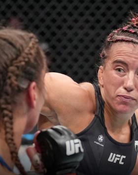 Maycee Barber punches Jessica Eye in a flyweight fight during the UFC 276 event at T-Mobile Arena on July 02, 2022 in Las Vegas, Nevada. (Photo by Jeff Bottari/Zuffa LLC)