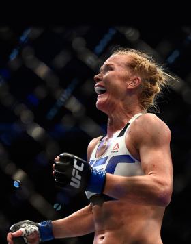 Holly Holm celebrates after defeating Ronda Rousey in their UFC women's bantamweight championship bout during the UFC 193 event at Etihad Stadium on November 15, 2015 in Melbourne, Australia. (Photo by Jeff Bottari/Zuffa LLC)