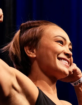 Michelle Waterson poses on the scale during the UFC Fight Night ceremonial weigh-in at UBS Arena on July 15, 2022 in Elmont, New York. (Photo by Mike Roach/Zuffa LLC)