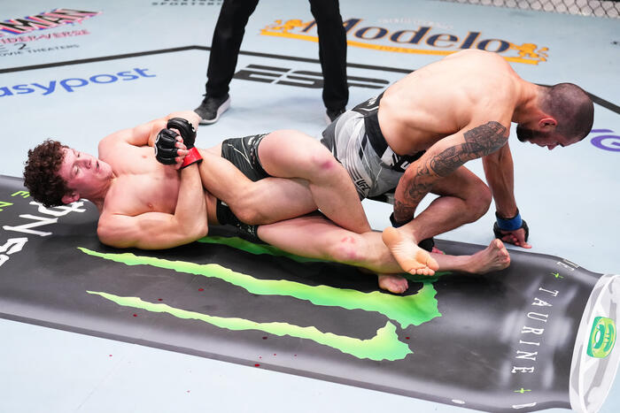 Chase Hooper attempts to submit Nick Fiore in a lightweight fight during the UFC Fight Night event at UFC APEX on May 20, 2023 in Las Vegas, Nevada. (Photo by Chris Unger/Zuffa LLC)