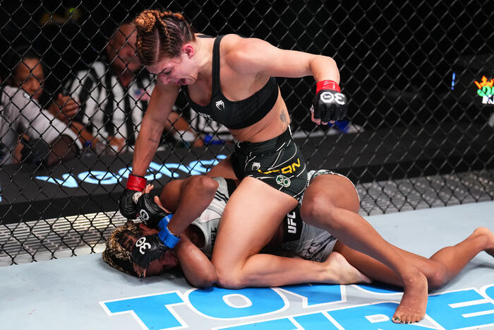 Mackenzie Dern punches Angela Hill in a strawweight fight during the UFC Fight Night event at UFC APEX on May 20, 2023 in Las Vegas, Nevada. (Photo by Chris Unger/Zuffa LLC)