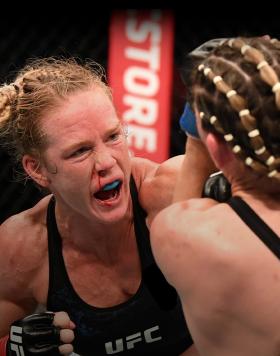 Holly Holm punches Irene Aldana of Mexico in their women's bantamweight bout during the UFC Fight Night event inside Flash Forum on UFC Fight Island on October 04, 2020 in Abu Dhabi, United Arab Emirates. (Photo by Josh Hedges/Zuffa LLC)