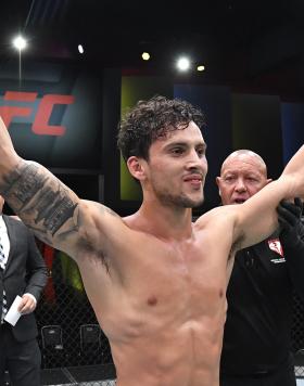 Claudio Puelles of Peru reacts after his victory over Jordan Leavitt in a lightweight fight during the UFC Fight Night event at UFC APEX on June 05, 2021 in Las Vegas, Nevada. (Photo by Jeff Bottari/Zuffa LLC)
