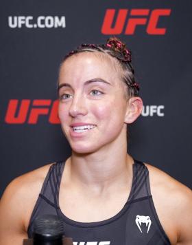 Maycee Barber reacts with UFC.com after her victory against Jessica Eye at UFC 276: Adesanya vs Cannonier