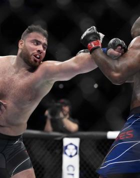 Hamdy Abdelwahab of Egypt punches Don'Tale Mayes in a heavyweight fight during the UFC 277 event