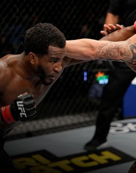 (L-R) Geoff Neal punches Santiago Ponzinibbio of Argentina during their welterweight bout during the UFC 269 on December 11, 2021 in Las Vegas, Nevada. (Photo by Jeff Bottari/Zuffa LLC)