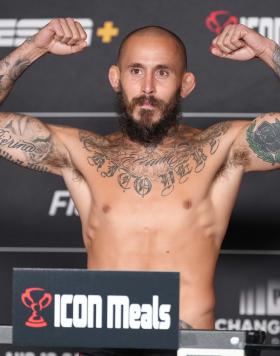 Marlon Vera of Ecuador poses on the scale during the UFC Fight Night official weigh-in