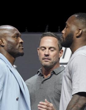 Opponents Kamaru Usman and Leon Edwards pose on stage during the UFC 278 press conference