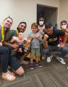 UFC athletes Brandon Moreno, Justin Gaethje, Jalin Turner, and Brendan Allen visit the Primary Children's Hospital in Salt Lake City, Utah. (Photo by Melissa Majchrzak via Primary Children's Hospital)