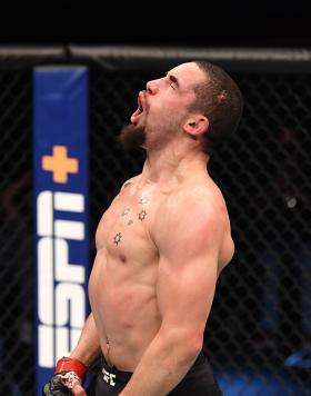 Robert Whittaker of Australia reacts after the conclusion of his middleweight bout against Jared Cannonier during the UFC 254 event on October 25, 2020 on UFC Fight Island, Abu Dhabi, United Arab Emirates. (Photo by Josh Hedges/Zuffa LLC 