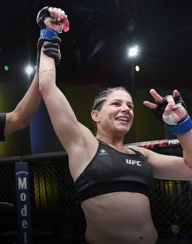  Karol Rosa of Brazil celebrates her victory over Bethe Correia of Brazil in their women's bantamweight bout during the UFC Fight Night event at UFC APEX on October 02, 2021 in Las Vegas, Nevada. (Photo by Jeff Bottari/Zuffa LLC)