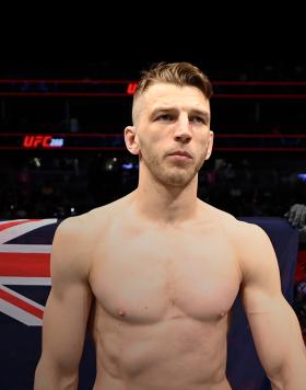 Dan Hooker of New Zealand enters the Octagon during the UFC 266 event