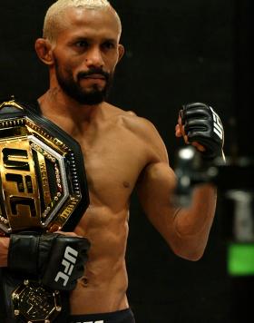 Deiveson Figueiredo Poses With Flyweight Championship Belt