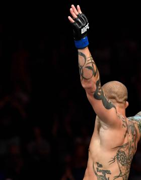 Anthony Smith celebrates after his TKO victory over Mauricio Rua of Brazil in their light heavyweight bout during the UFC Fight Night at Barclaycard Arena on July 22, 2018 in Hamburg, Germany. (Photo by Jeff Bottari/Zuffa LLC/Zuffa LLC via Getty Images)