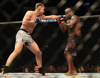 Alexander Volkov punches Derrick Lewis in their heavyweight bout during the UFC 229 event inside T-Mobile Arena on October 6, 2018 in Las Vegas, Nevada.