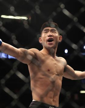 Song Yadong of China reacts to defeating Alejandro Perez of Mexico punches during their UFC 239 Bantamweight bout at T-Mobile Arena on July 06, 2019 in Las Vegas, Nevada. (Photo by Sean M. Haffey/Getty Images)