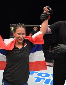 Loma Lookboonmee of Thailand celebrates after defeating Jinh Yu Frey in their women's strawweight bout during the UFC Fight Night event inside Flash Forum on UFC Fight Island on October 04, 2020 in Abu Dhabi, United Arab Emirates. (Photo by Josh Hedges/Zuffa LLC)