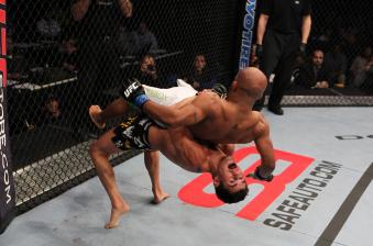 Dominick Cruz throws his opponent during the UFC on Versus event at the Verizon Center on October 1, 2011 in 