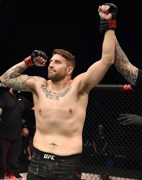 Chris Daukaus celebrates his victory over Rodrigo Nascimento of Brazil in their heavyweight bout during the UFC Fight Night event inside Flash Forum on UFC Fight Island on October 11, 2020 in Abu Dhabi, UAE (Photo by Josh Hedges/Zuffa LLC)