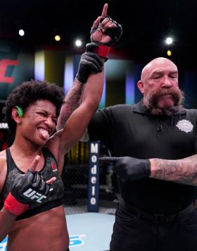 Angela Hill reacts after her victory over Ashley Yoder in a strawweight fight during the UFC Fight Night event at UFC APEX on March 13, 2021 in Las Vegas, Nevada. (Photo by Jeff Bottari/Zuffa LLC via Getty Images)