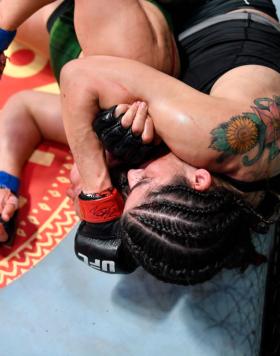 Julia Avila secures a rear choke against Julija Stoliarenko of Lithuania in a bantamweight fight during the UFC Fight Night event at UFC APEX on June 26, 2021 in Las Vegas, Nevada. (Photo by Chris Unger/Zuffa LLC)
