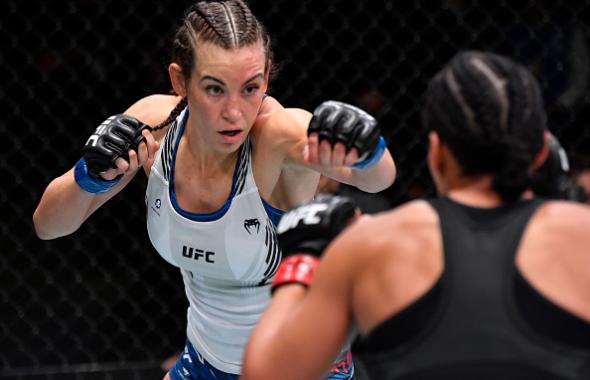 Miesha Tate battles Marion Reneau in their bantamweight bout during the UFC Fight Night event at UFC APEX on July 17, 2021 in Las Vegas, Nevada. (Photo by Jeff Bottari/Zuffa LLC)