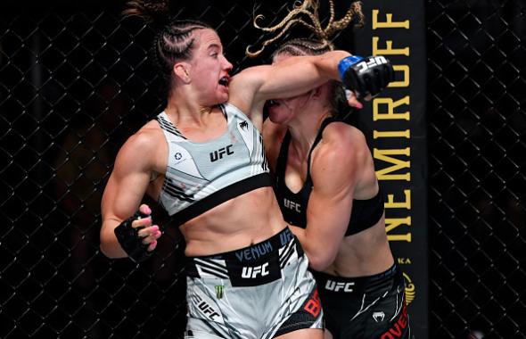 Maycee Barber lands a spinning back elbow against Miranda Maverick in their flyweight fight during the UFC Fight Night event at UFC APEX on July 24, 2021 in Las Vegas, Nevada. (Photo by Jeff Bottari/Zuffa LLC)