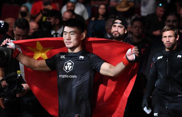Song Yadong of China walks out prior to facing Casey Kenney in their bantamweight bout during the UFC 265 event at Toyota Center on August 07, 2021 in Houston, Texas. (Photo by Josh Hedges/Zuffa LLC)