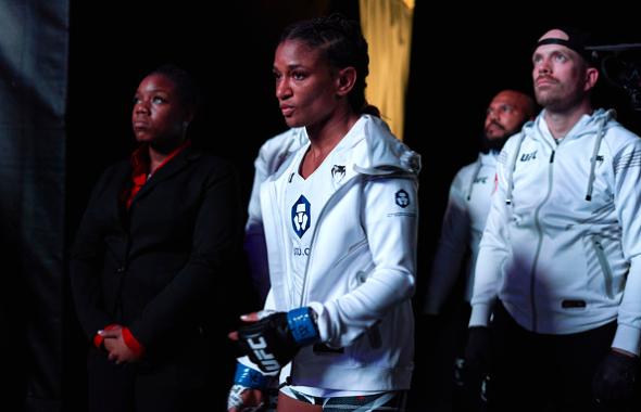 Angela Hill walks out prior to her women's strawweight bout during the UFC 265 event at Toyota Center on August 07, 2021 in Houston, Texas. (Photo by Cooper Neill/Zuffa LLC)