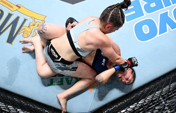 Erin Blanchfield punches Sarah Alpar in a flyweight fight during the UFC Fight Night event at UFC APEX on September 18, 2021 in Las Vegas, Nevada. (Photo by Jeff Bottari/Zuffa LLC)
