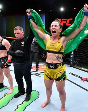 Norma Dumont of Brazil reacts after her victory over Aspen Ladd in a featherweight fight during the UFC Fight Night event at UFC APEX on October 16 2021 in Las Vegas Nevada. (Photo by Chris Unger/Zuffa LLC)