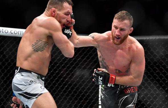 Justin Gaethje punches Michael Chandler in their lightweight fight during the UFC 268 event at Madison Square Garden on November 06, 2021 in New York City. (Photo by Chris Unger/Zuffa LLC)