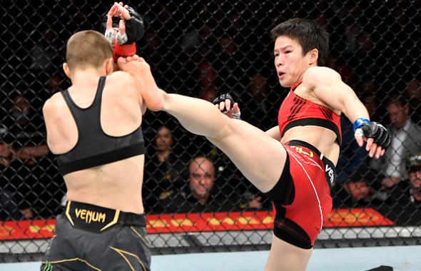 Zhang Weili of China kicks Rose Namajunas in their UFC strawweight championship fight during the UFC 268 event at Madison Square Garden on November 06, 2021 in New York City. (Photo by Jeff Bottari/Zuffa LLC)