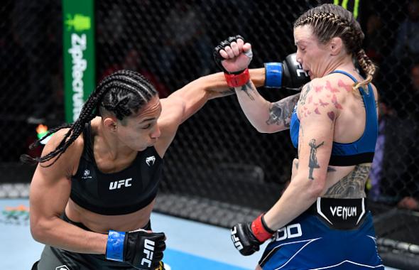Taila Santos of Brazil punches Joanne Wood of Scotland in a flyweight fight during the UFC Fight Night event at UFC APEX on November 20, 2021 in Las Vegas, Nevada. (Photo by Chris Unger/Zuffa LLC)