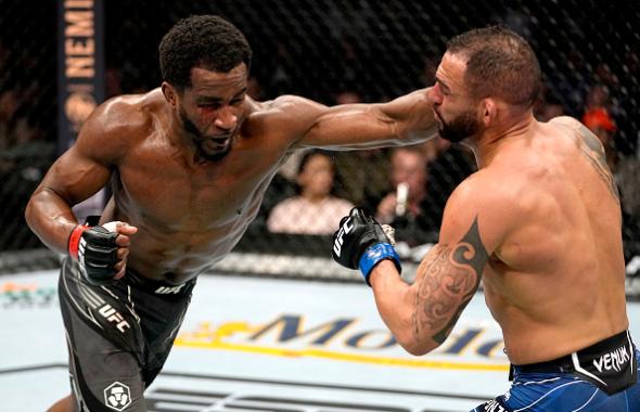 Geoff Neal punches Santiago Ponzinibbio of Argentina during their welterweight bout during the UFC 269 on December 11, 2021 in Las Vegas, Nevada. (Photo by Jeff Bottari/Zuffa LLC)