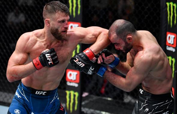 Calvin Kattar elbows Giga Chikadze of Georgia in their featherweight fight during the UFC Fight Night event at UFC APEX on January 15, 2022 in Las Vegas, Nevada. (Photo by Jeff Bottari/Zuffa LLC via Getty Images)