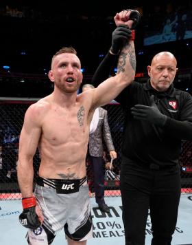 Tim Elliott reacts after his victory over Tagir Ulanbekov of Russia in their flyweight fight during the UFC 272 event on March 05, 2022 in Las Vegas, Nevada. (Photo by Jeff Bottari/Zuffa LLC)