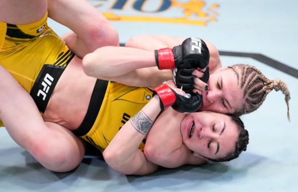 Miranda Maverick secures a choke submission against Sabina Mazo of Colombia in their flyweight fight during the UFC Fight Night event at UFC APEX on March 12, 2022 in Las Vegas, Nevada. (Photo by Chris Unger/Zuffa LLC)