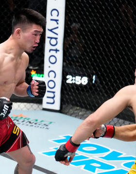 Song Yadong of China drops Marlon Moraes of Brazil in their bantamweight fight during the UFC Fight Night event at UFC APEX on March 12, 2022 in Las Vegas, Nevada. (Photo by Chris Unger/Zuffa LLC)