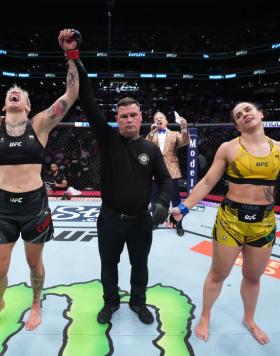 Macy Chiasson (L) reacts after her split-decision victory over Norma Dumont of Brazil in a featherweight fight during the UFC 274 event at Footprint Center on May 07, 2022 in Phoenix, Arizona. (Photo by Chris Unger/Zuffa LLC)