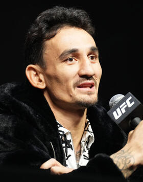 Max Holloway is seen on stage during the UFC 276 press conference at T-Mobile Arena on June 30, 2022 in Las Vegas, Nevada. (Photo by Chris Unger/Zuffa LLC)