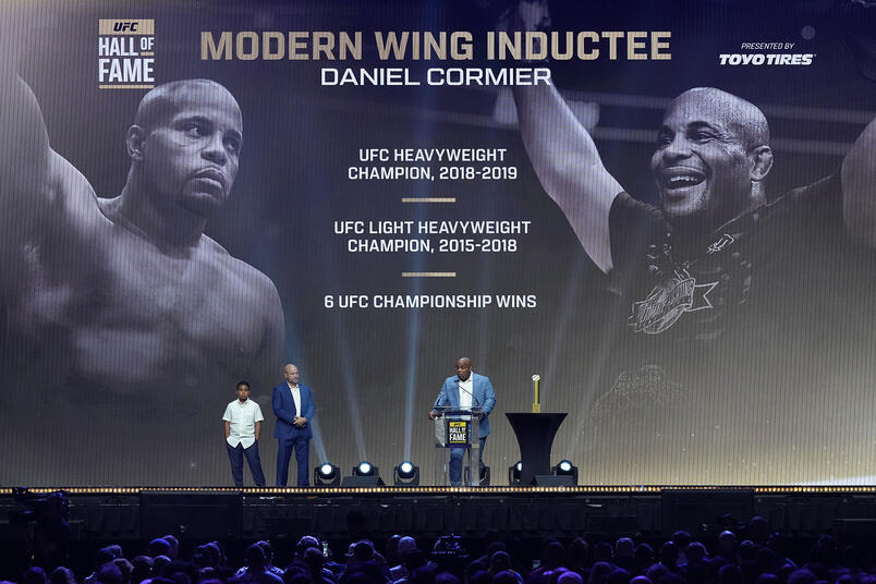 Daniel Cormier speaks during the UFC Hall of Fame induction ceremony at T-Mobile Arena on June 30, 2022 in Las Vegas, Nevada. (Photo by Jeff Bottari/Zuffa LLC)
