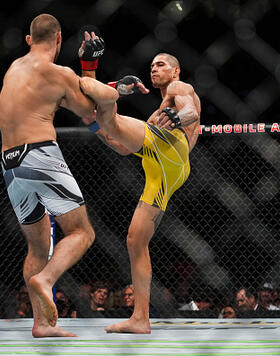 Alex Pereira of Brazil kicks Sean Strickland during the UFC 276 event at T-Mobile Arena on July 02, 2022 in Las Vegas, Nevada. (Photo by Cooper Neill/Zuffa LLC)